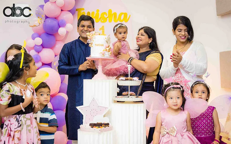 Birthday party picture of an Indian family