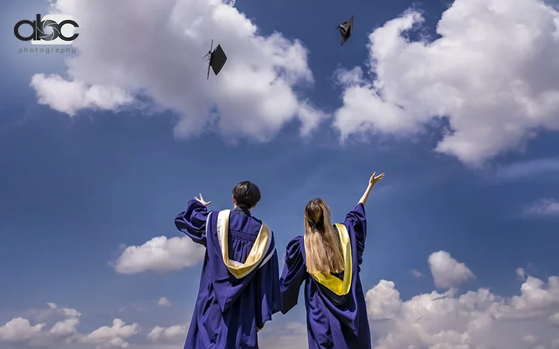 Candid Graduation photo of 2 people