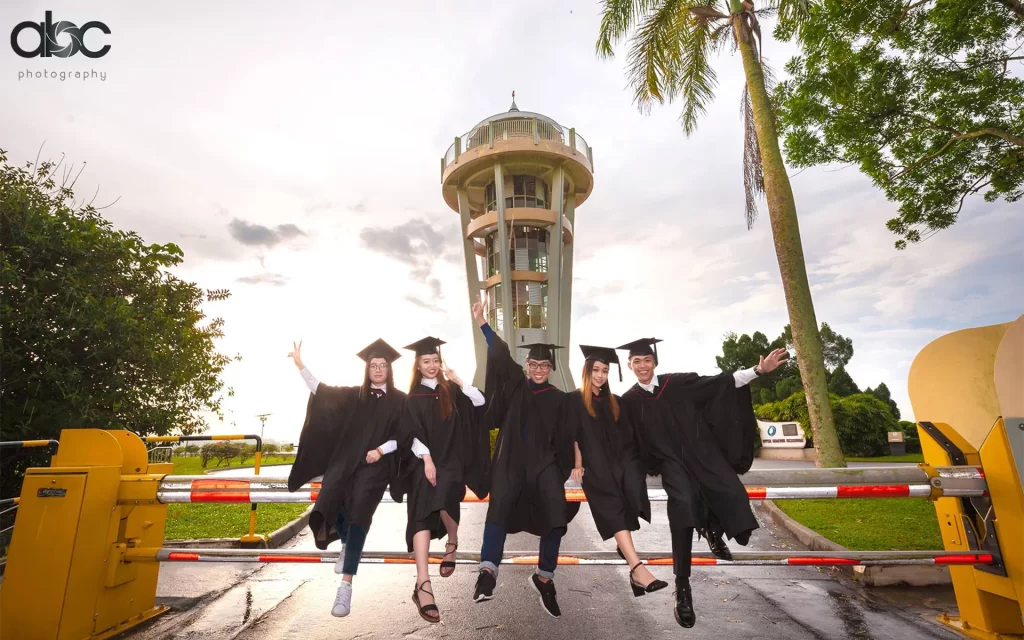 Students having a photoshoot after graduating