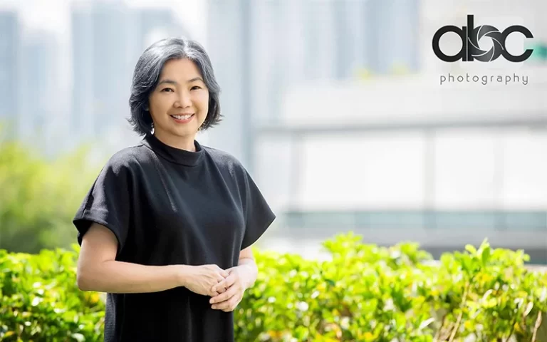 Asian woman posing for a portrait photo outdoors