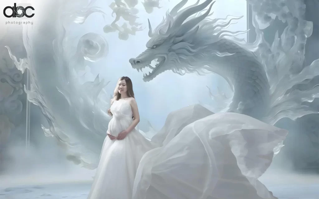 maternity photo ideas with a white dragon background