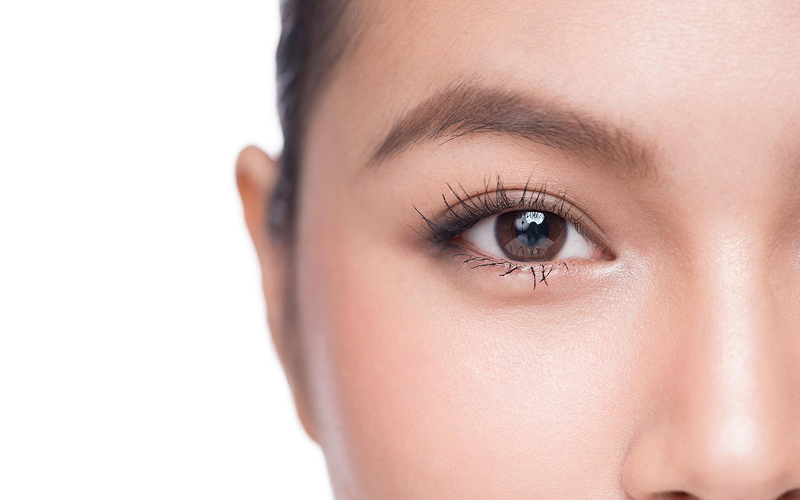 Close-up of confident eyes during a professional portrait photoshoot.