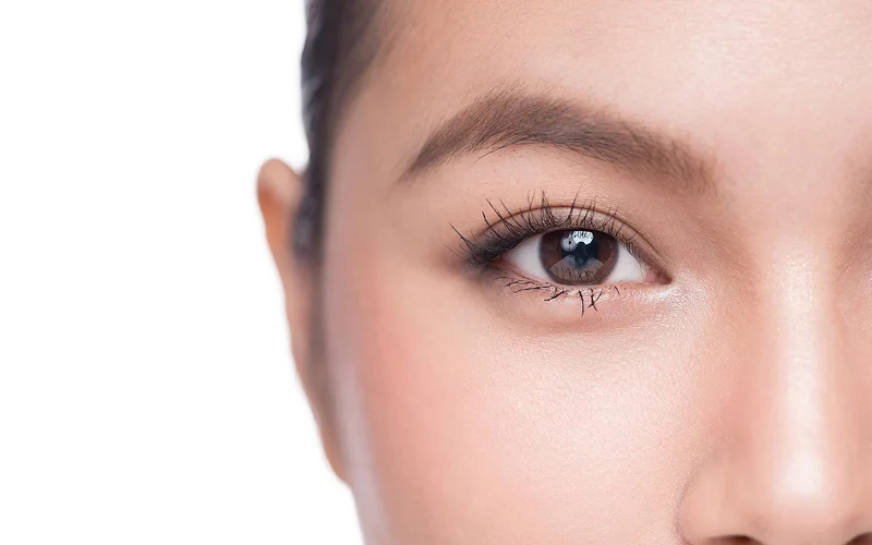 Close-up of confident eyes during a professional portrait photoshoot.