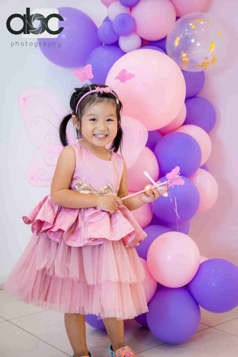 Girl in pink tutu birthday photoshoot