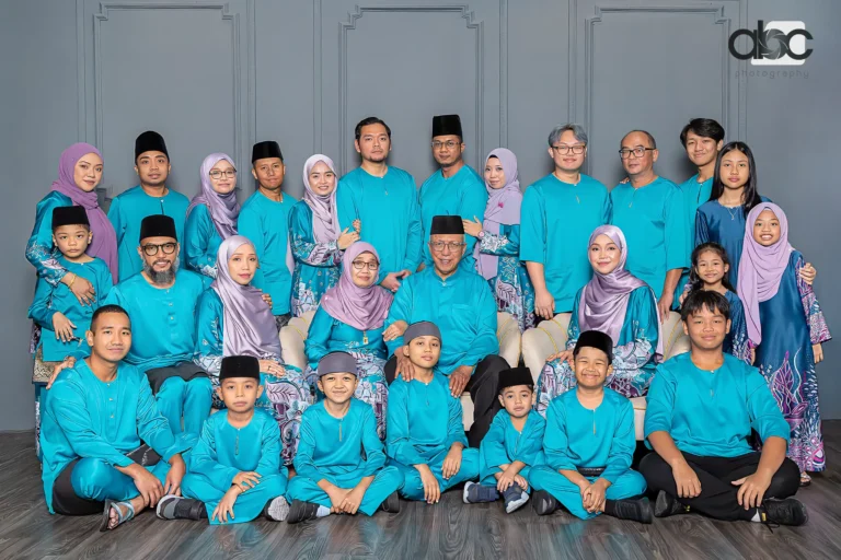 Family portrait with matching teal outfits