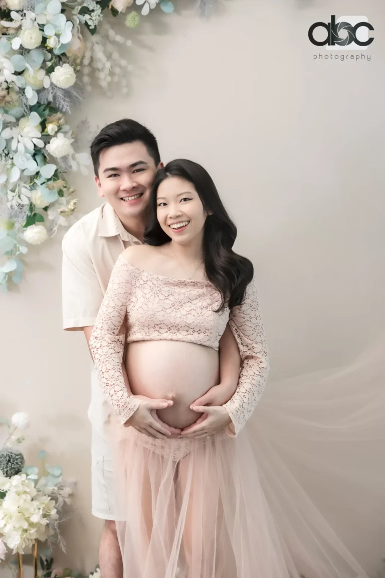Prenatal photography Singapore couple in beige