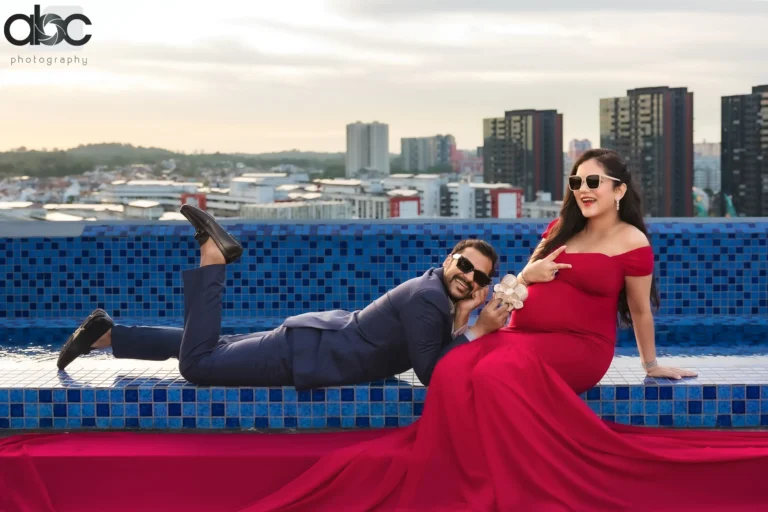 Maternity photoshoot Singapore skyline rooftop couple