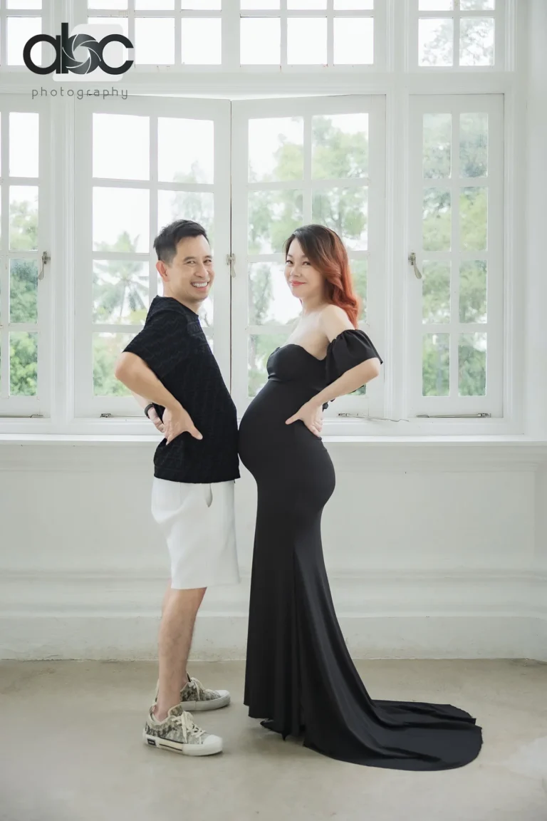 Maternity photoshoot by studio window Singapore