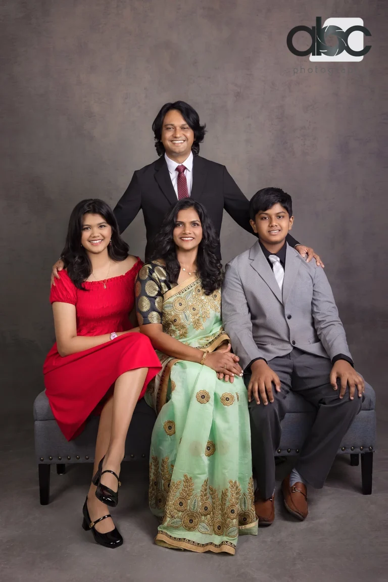 Family studio portrait with teenagers