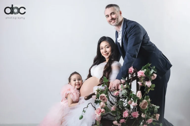 Family maternity photoshoot with flowers