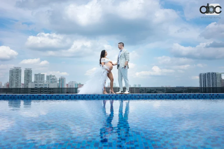 Pregnancy outdoor photoshoot Singapore rooftop pool