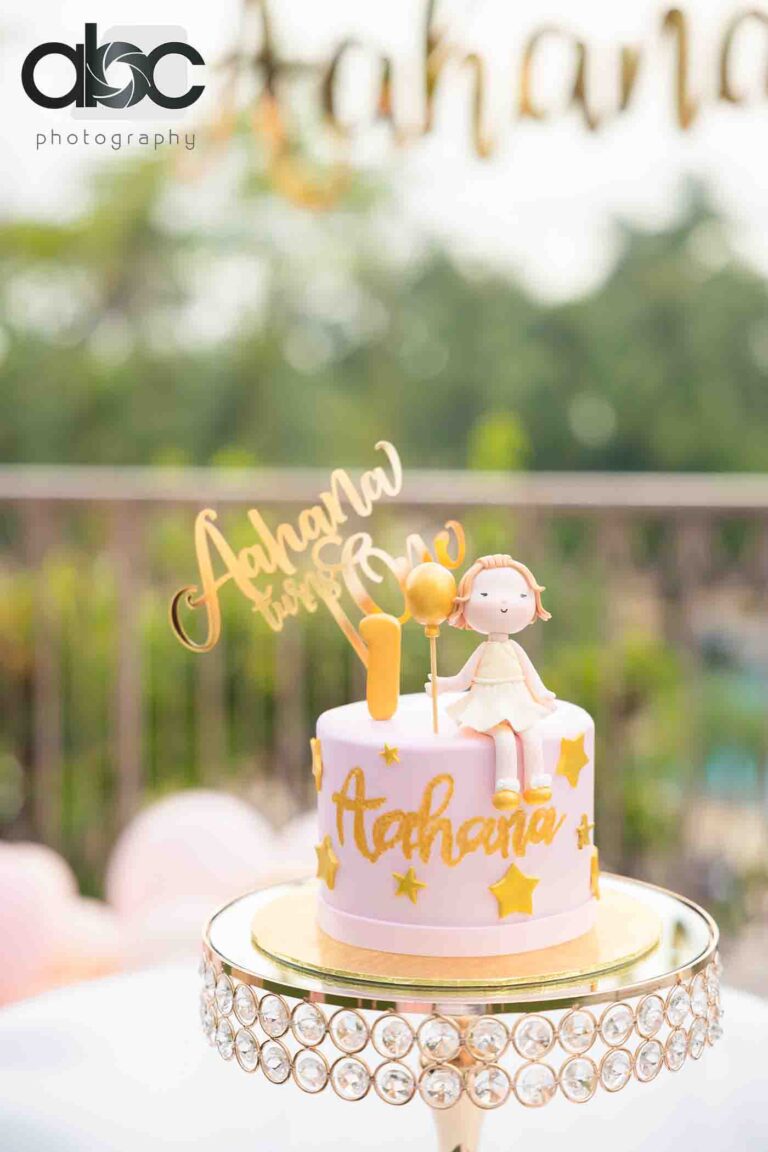 Pink first birthday cake close-up