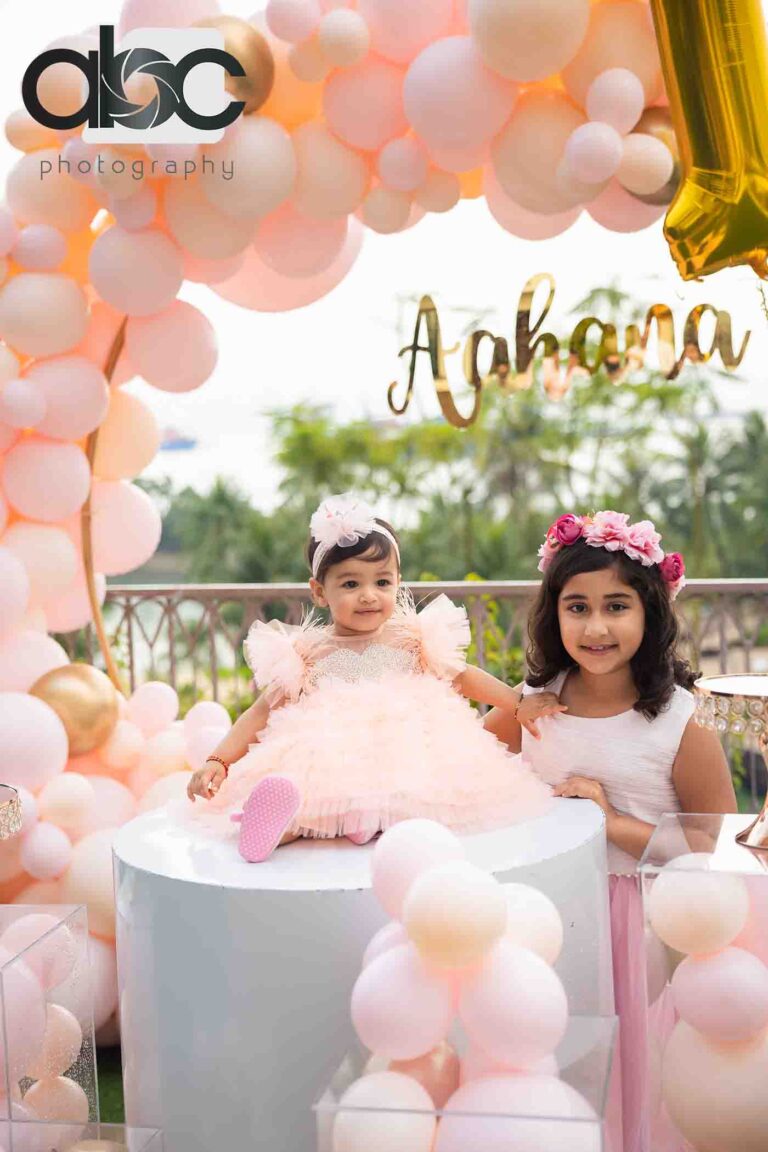 Sisters at outdoor birthday photoshoot