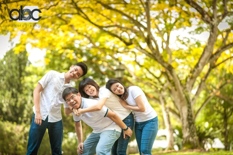Playful family portrait outdoors