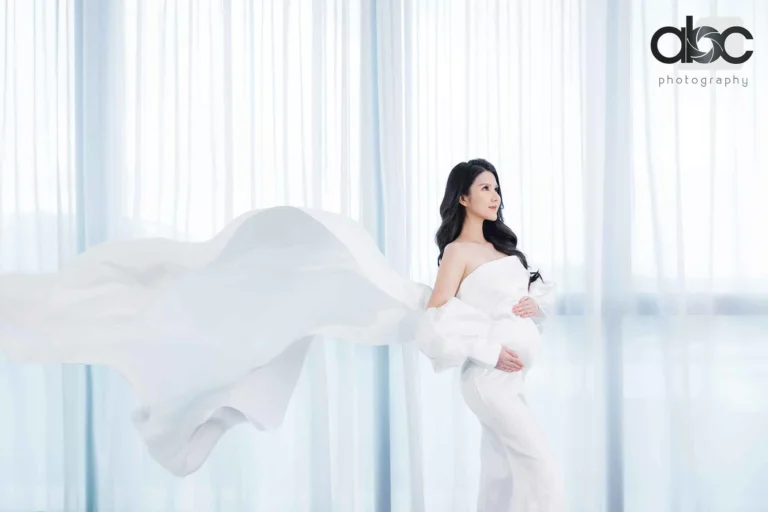 Maternity photoshoot Singapore flowing white fabric