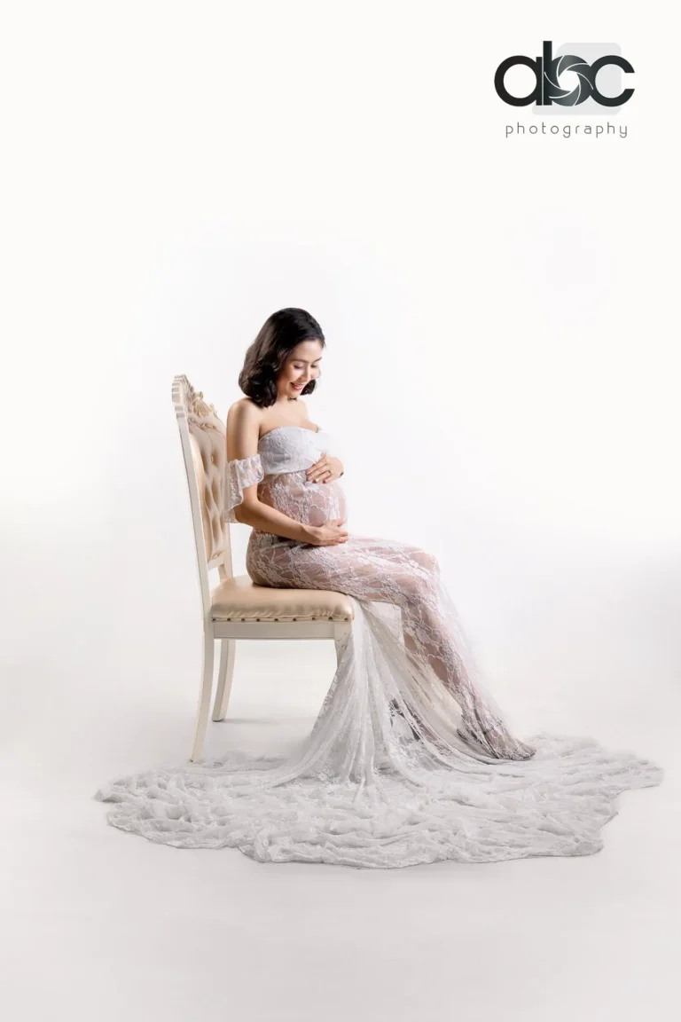 Maternity portrait on vintage chair
