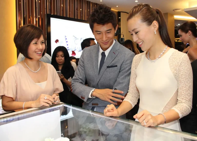 Guests viewing jewellery display at event