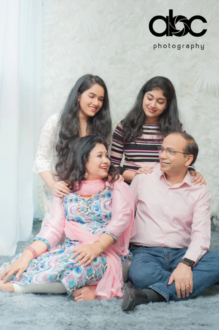 Family portrait in pastel outfits