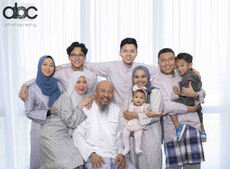 Family portrait in light grey outfits