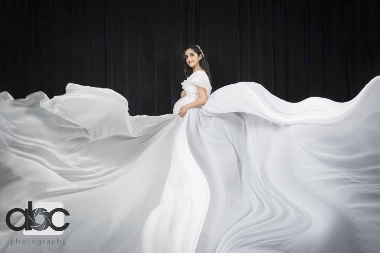 Maternity photoshoot Singapore flowing white gown