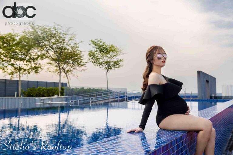 Rooftop poolside maternity photoshoot Singapore