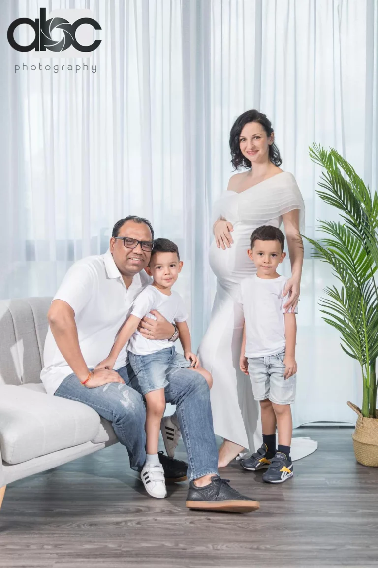 Family photoshoot in bright studio