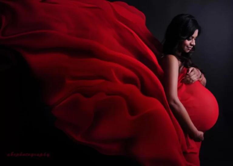Maternity portrait in red fabric Singapore