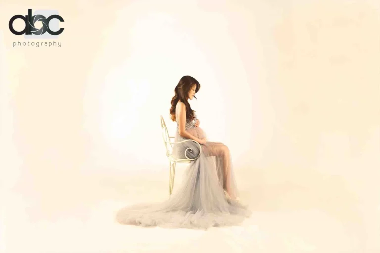 Maternity photoshoot studio in soft cream