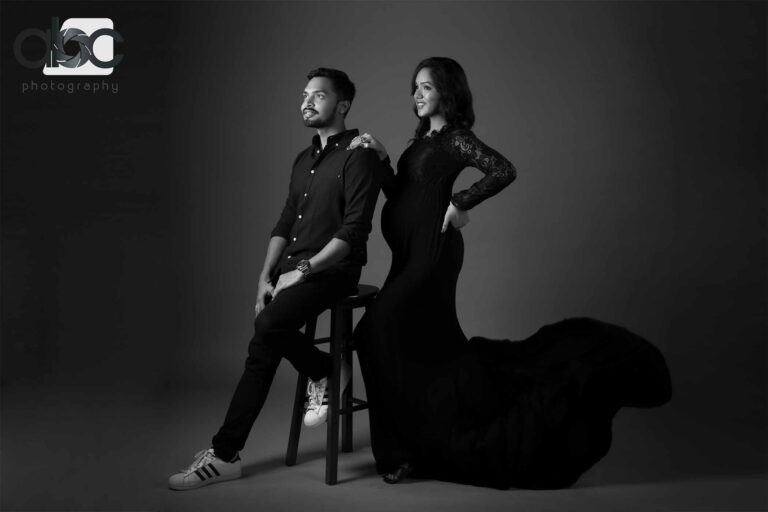 Couple maternity photoshoot in black outfits