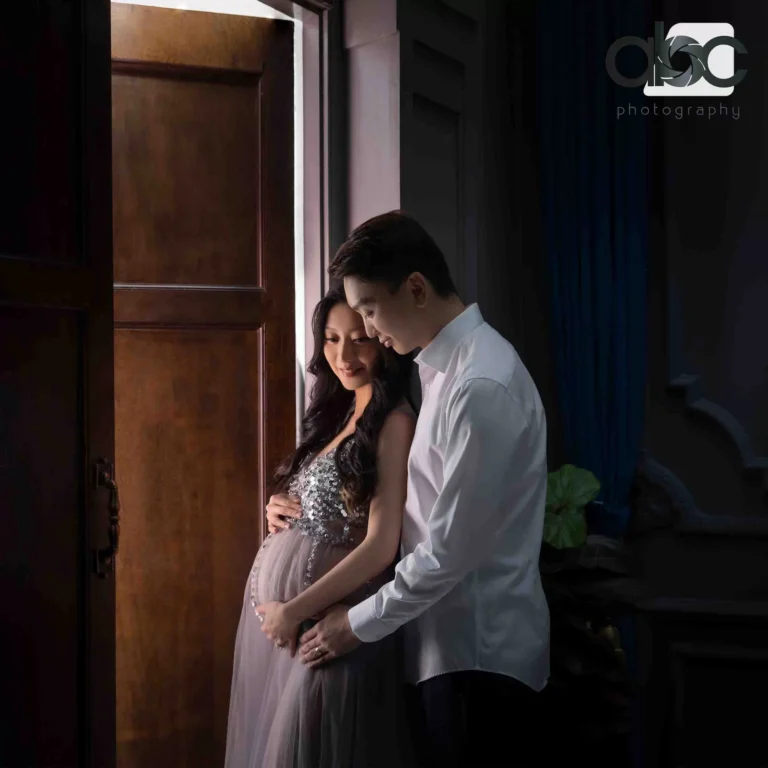 Couple maternity portrait Singapore wooden door