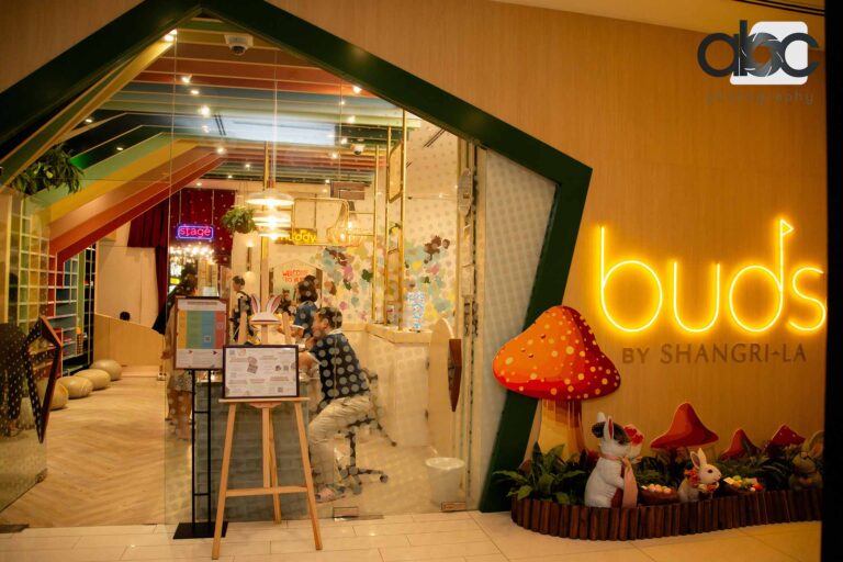 Kids studio entrance with neon sign