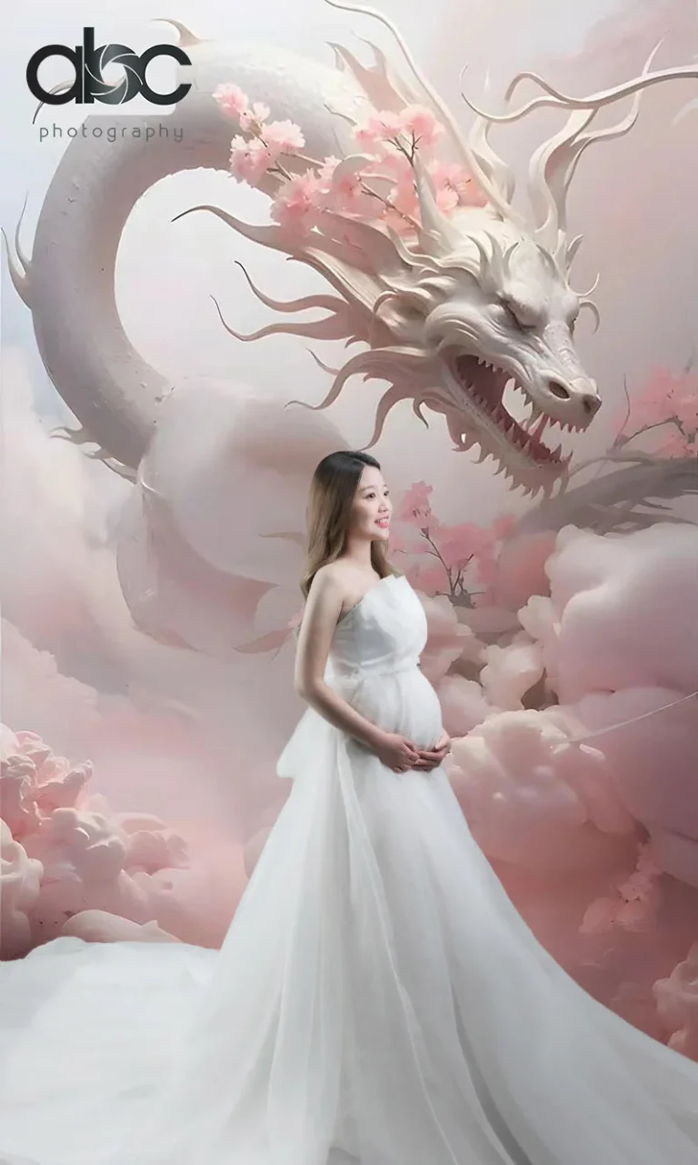 Maternity photoshoot with pink dragon backdrop