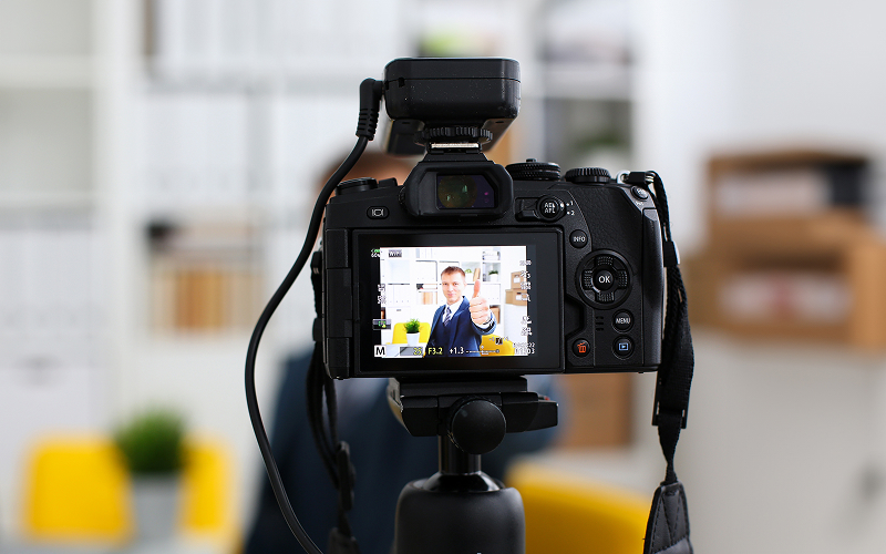 Camera screen showing portrait photography composition framing a subject.